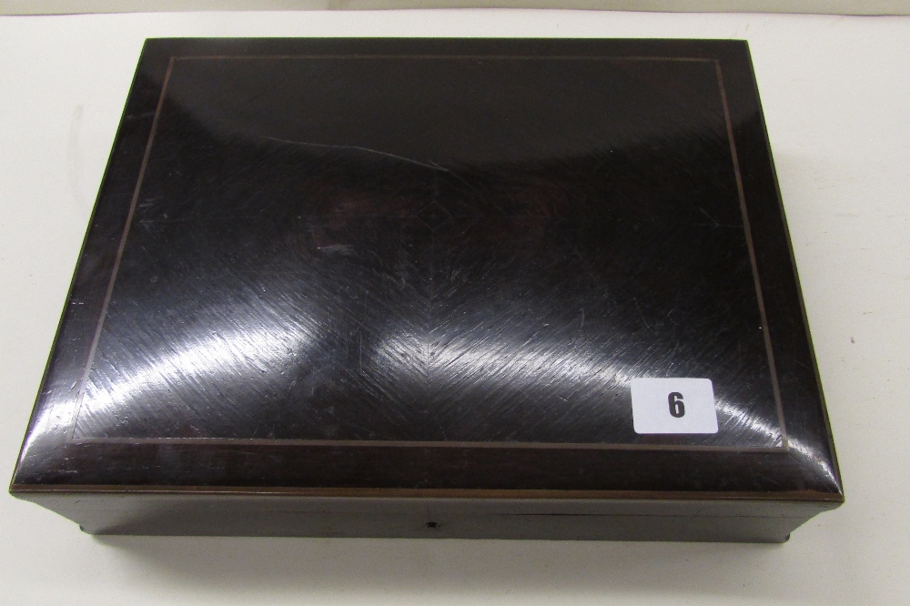 ROSEWOOD AND BRASS BANDED RECTANGULAR BOX WITH CANTED EDGES 31CM W