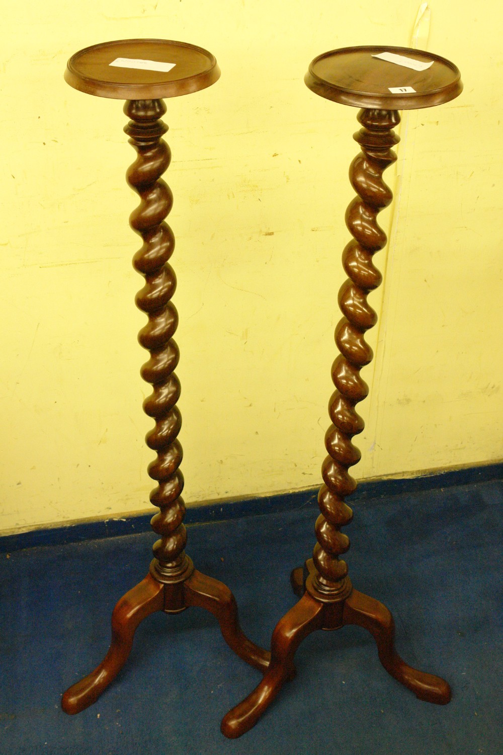 PAIR OF WALNUT BARLEYTWIST TRIPOD TORCHERE STANDS (THE TRIPOD BASE LATER) 126CM H