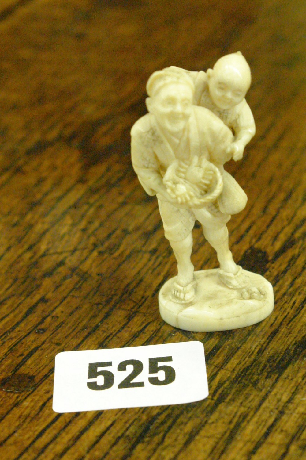 JAPANESE IVORY OKIMONO FIGURE CARRYING A CRAB BASKET AND SMALL BOY ON HIS BACK 5.6CM