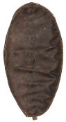 A good 19th century Masai shield, 104 x 62cms, hide, with wooden central support, and possible
