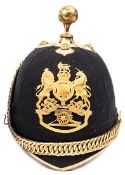 A post-1902 Canadian officer?s ball topped blue cloth helmet of the Royal Canadian Artillery, gilt