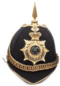 A Victorian officer?s blue cloth spiked helmet of The South Wales Borderers, gilt top mount and