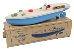 A Sutcliffe tinplate clockwork 1937 ?Bluebird? K3 water speed record boat. In white and light blue