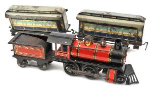 A rare O gauge U.S. outline 4-4-0 tender locomotive by Issmayer. Loco and 4 wheel tender in red and