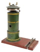 A rare Marklin gauge 3 clockwork trackside bell. In the style of a light house, painted in leaf