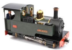 A 16mm gauge live steam model of a 0-4-0 tank locomotive by Accucraft. An outside cylinder Caradoc