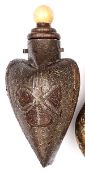 An unusual North African heart shaped wooden flask, carved with small panels of stylized