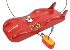 A rare Arnold large tinplate 1956 Renault Etoile Filante. 28cm painted in red with yellow flash,