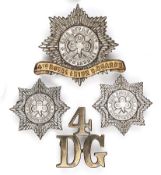 A good 4th DG OR?s bi-metal cap badge, with lugs, a pair collars and a brass 4/DG title with lugs (