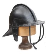 A Cromwellian trooper?s triple bar lobster tail helmet, the 2 piece skull with low medial ridge,