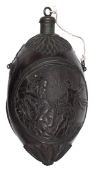 A late 18th century French coconut flask, well carved overall, with a circular panel of 2 female