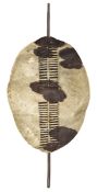 A 19th century Zulu war shield, 35” x 24”, white hair with black spots, VGC Plate 10