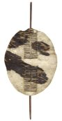 A 19th century Zulu war shield, 32” x 24”, white hair, large black spots, some buckling, small