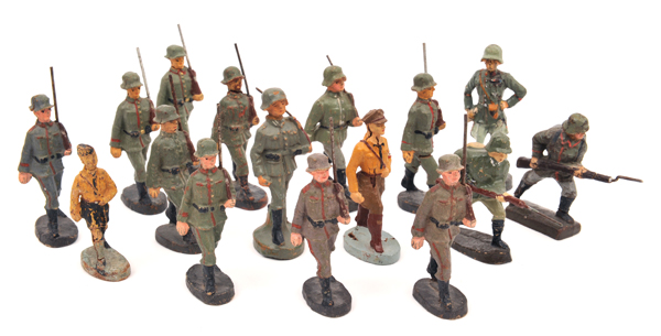 17 composition German soldiers by Elastolin and other makers. 12 marching with rifles shouldered,