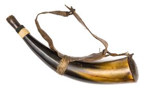 A large 19th Century Southern African powder horn, possibly Zulu, of shaped cowhorn, with old