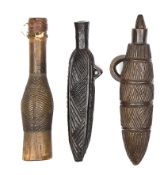 Three late 19th century Shona snuff containers, all with characteristic engraved grooved decoration,
