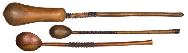 Three fine late 19th century Zulu wooden spoons, one, 21” overall, has an unusual undulating