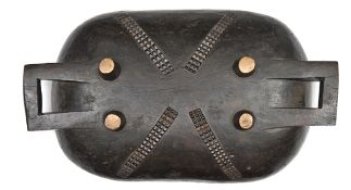 A large Zulu meat tray, uqogo, the early 20th century wooden dish 24” x 15”, the underside (shown)