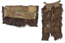 Two old, possibly late 19th century, Zulu mens’ buttock covers, amabeshu, of brown calf skin, with