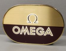 A RARE ILLUMINATED OMEGA SHOP DISPLAY SIGN Dimensions are approximately 9.5/14.5 inches. CONDITION