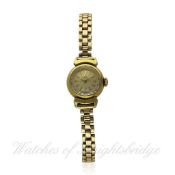 A LADIES 18K SOLID GOLD OMEGA WRISTWATCH CIRCA 1960s D: Silver dial with gilt batons. M: 17 jewel