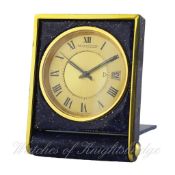 A GILT METAL LACQUERED JAEGER LECOULTRE ALARM TRAVEL CLOCK CIRCA 1970 D: Two piece champagne dial