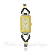 A RARE LADIES STEEL & SOLID GOLD JAEGER LECOULTRE REVERSO WRISTWATCH CIRCA 1930s D: Silver dial with