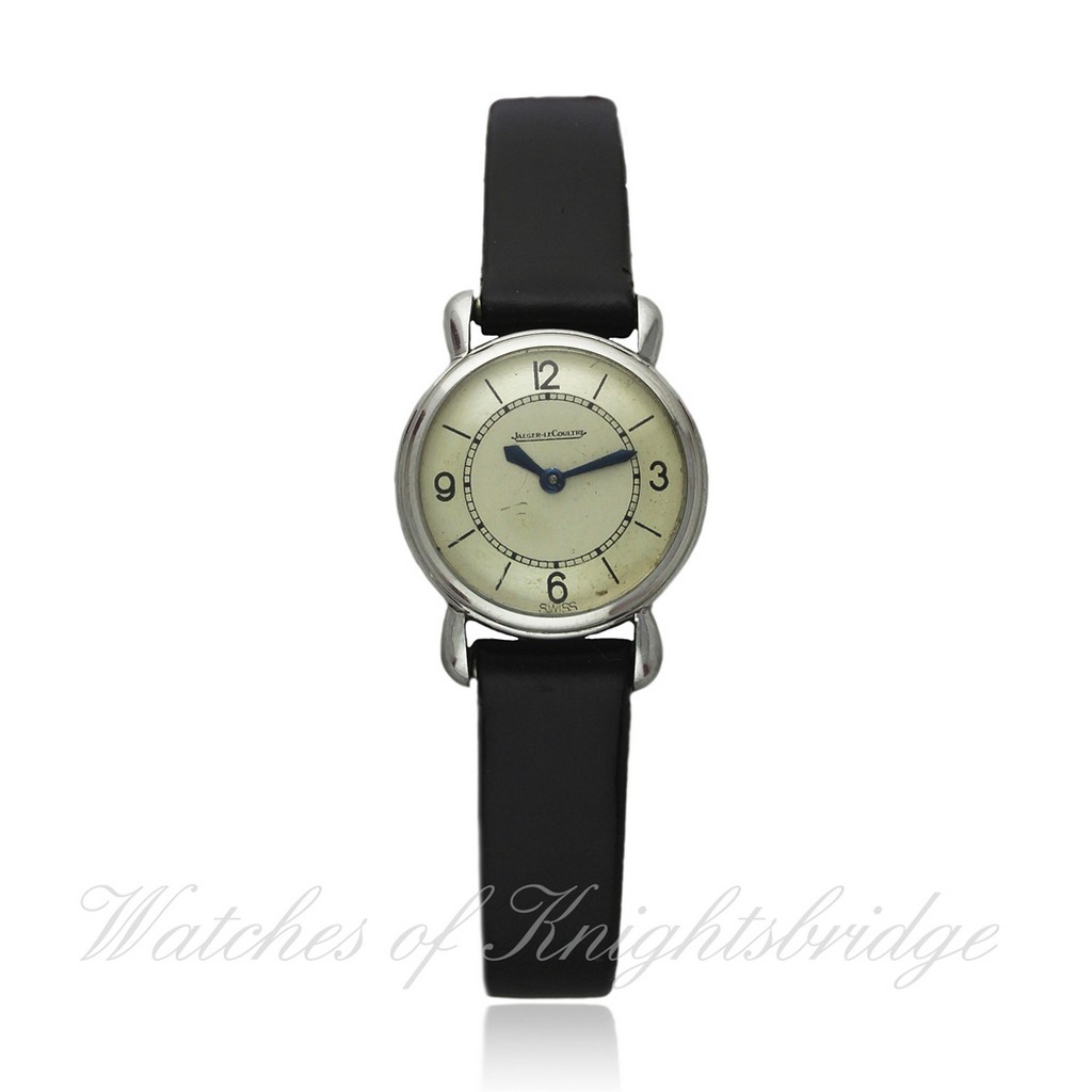 A LADIES STAINLESS STEEL JAEGER LECOULTRE WRISTWATCH CIRCA 1940s D: Two tone silver dial with raised