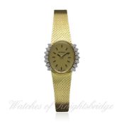 A LADIES 14K SOLID GOLD & DIAMOND MOVADO ZENITH BRACELET WATCH CIRCA 1970s D: Champagne dial with