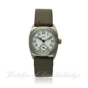 A GENTLEMAN`S STAINLESS STEEL CYMA WRISTWATCH CIRCA 1940s D: White enamel dial with applied "