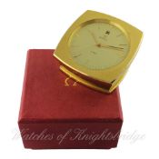 A GILT METAL OMEGA 8 DAY DESK CLOCK CIRCA 1970s IN ORIGINAL BOX D: Champagne dial with gilt