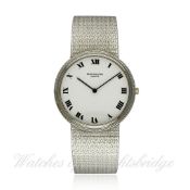 A FINE GENTLEMAN`S 18K SOLID WHITE GOLD PATEK PHILIPPE CALATRAVA BRACELET WATCH CIRCA 1990, REF.