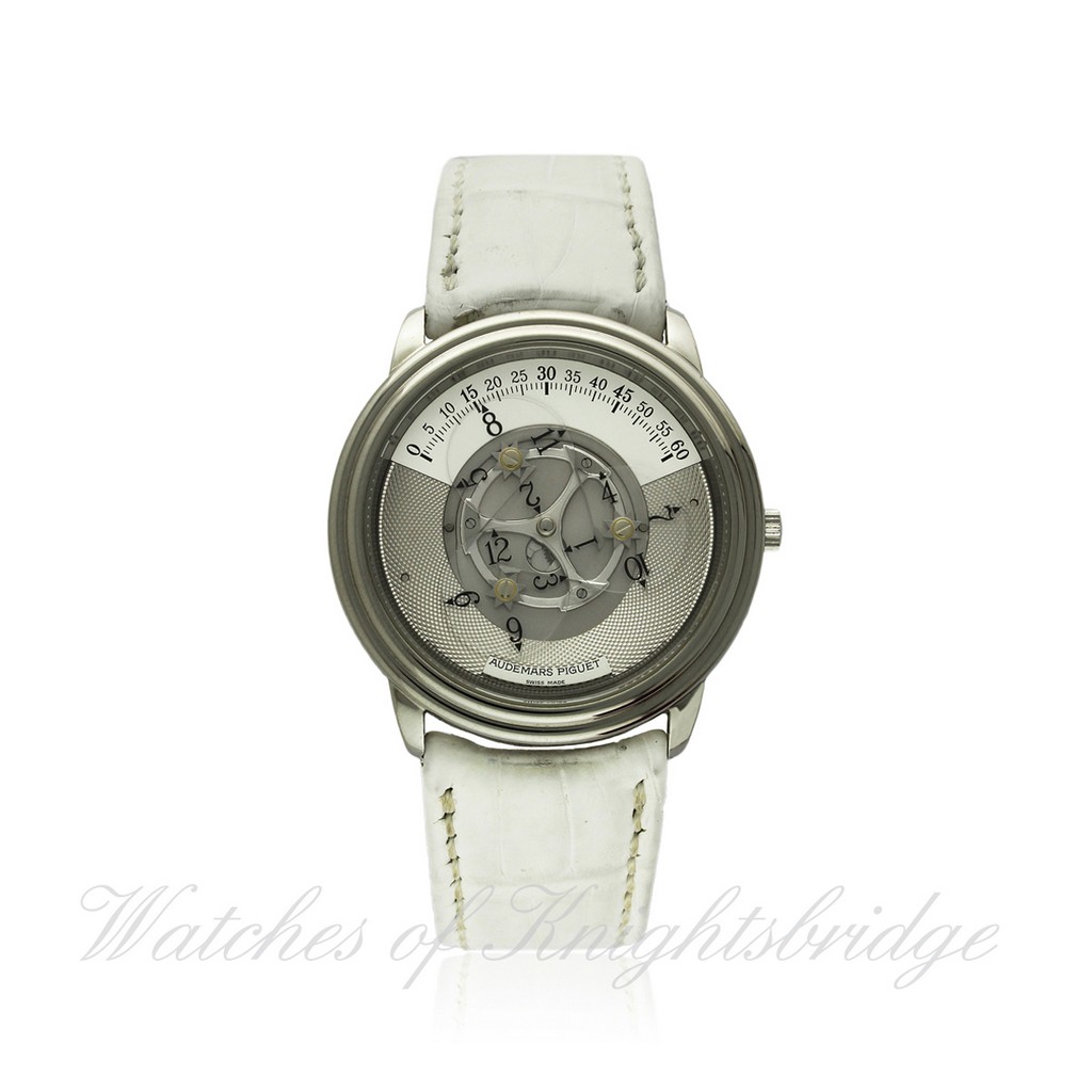 A FINE & RARE GENTLEMAN`S PLATINUM AUDEMARS PIGUET STAR WHEEL "WANDERING HOUR" WRISTWATCH CIRCA