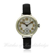 A RARE GENTLEMAN`S SOLID SILVER ROLEX "OFFICERS" WRISTWATCH CIRCA 1916 D: White enamel dial with