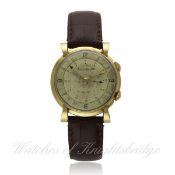 A GENTLEMAN`S GOLD PLATED JAEGER LECOULTRE MEMOVOX ALARM WRIST WATCH CIRCA 1950s, RETAILED BY