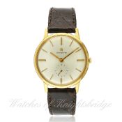 A GENTLEMAN`S 18K SOLID GOLD ZENITH WRIST WATCH CIRCA 1960s D: Silver dial with gilt batons,