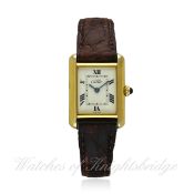 A LADIES SOLID SILVER GILT CARTIER TANK WRIST WATCH CIRCA 1990s, REF. 2415 D: White dial with bi-