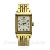 A FINE GENTLEMAN`S 18K SOLID GOLD JAEGER LECOULTRE REVERSO GRAN SPORT BRACELET WATCH CIRCA 2004,