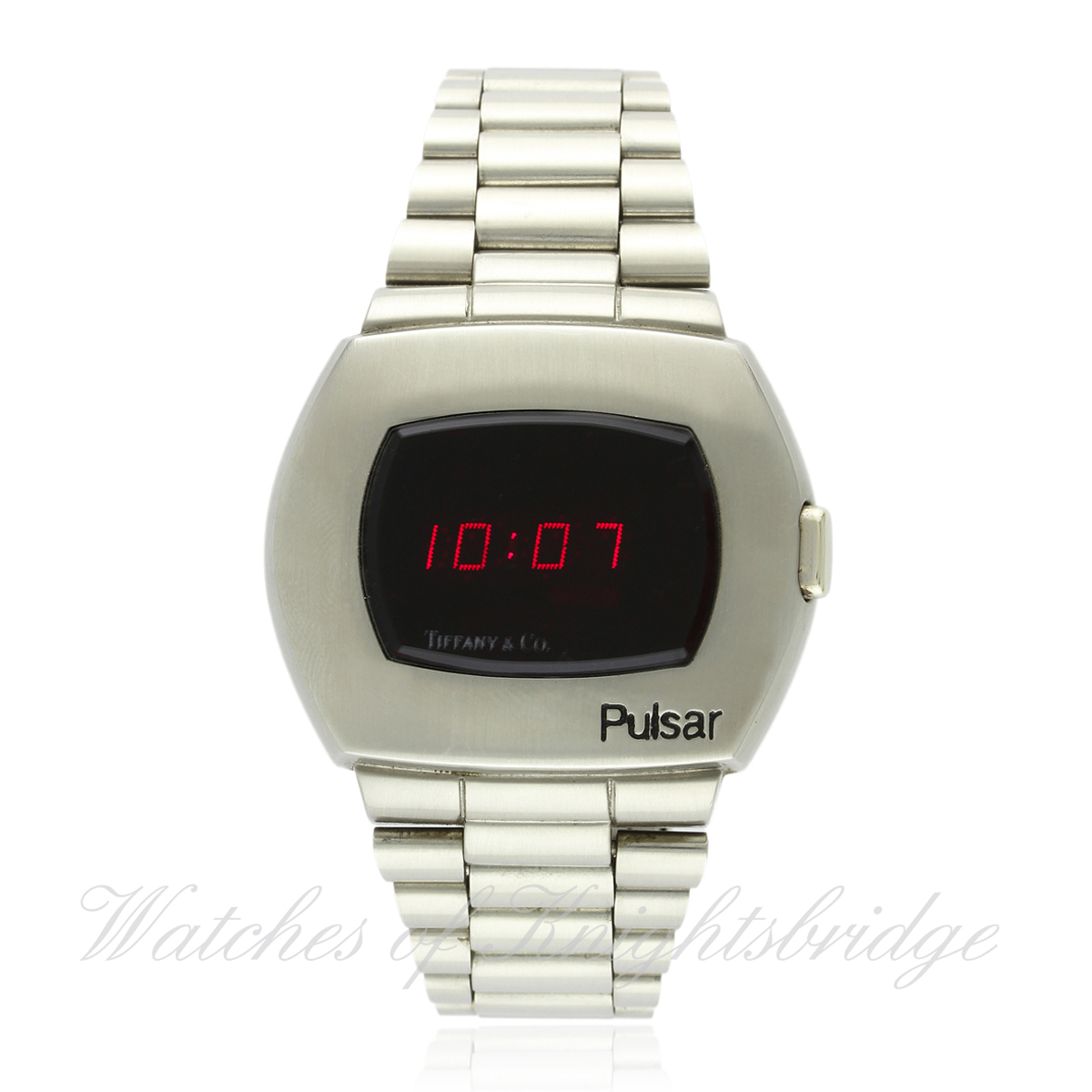 A GENTLEMAN`S STAINLESS STEEL PULSAR BRACELET WATCH CIRCA 1980s, RETAILED BY TIFFANY & CO. WITH