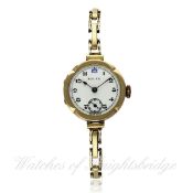 A LADIES 9CT SOLID GOLD ROLEX BRACELET WATCH CIRCA 1920s D: White enamel dial with applied Arabic