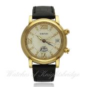 A GENTLEMAN`S 18K SOLID GOLD TOMPION ALARM GMT WRIST WATCH CIRCA 2008 D: Silver dial with luminous