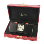 A PVD COATED LES PENDULETTE CARTIER ALARM DESK / TRAVEL CLOCK CIRCA 2012, REF. 2705 WITH ORIGINAL