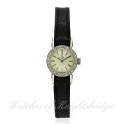 A LADIES 18K SOLID WHITE GOLD & DIAMOND OMEGA COCKTAIL WATCH DATED 1973, REF. 8115663 WITH