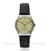 A BOY`S SIZE STAINLESS STEEL JAEGER LECOULTRE WRIST WATCH CIRCA 1940s D: Silver dial with raised