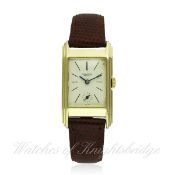 A GENTLEMAN`S 14K SOLID GOLD IWC RECTANGULAR WRIST WATCH CIRCA 1940s D: Silver dial with applied