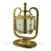 A RARE 8 DAY IMHOF ROTATING 4 SIDED GILT MANTEL CLOCK WITH BAROMETER, THERMOMETER AND HYGROMETER