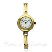 A LADIES 18K SOLID GOLD ROLEX BRACELET WATCH CIRCA 1920s D: White enamel dial with applied Arabic