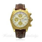 A GENTLEMAN`S 18K SOLID GOLD BREITLING CHRONOMAT EVOLUTION CHRONOGRAPH WRIST WATCH CIRCA 2005,