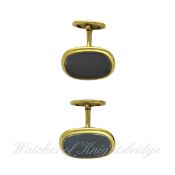 A PAIR OF 18K SOLID GOLD PATEK PHILIPPE ELLIPSE CUFFLINKS Signed & hallmarked.      CONDITION REPORT