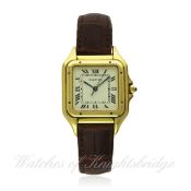 A GENTLEMAN`S 18K SOLID GOLD CARTIER PANTHERE WRIST WATCH CIRCA 1990s, REF. 106000M D: Silver dial